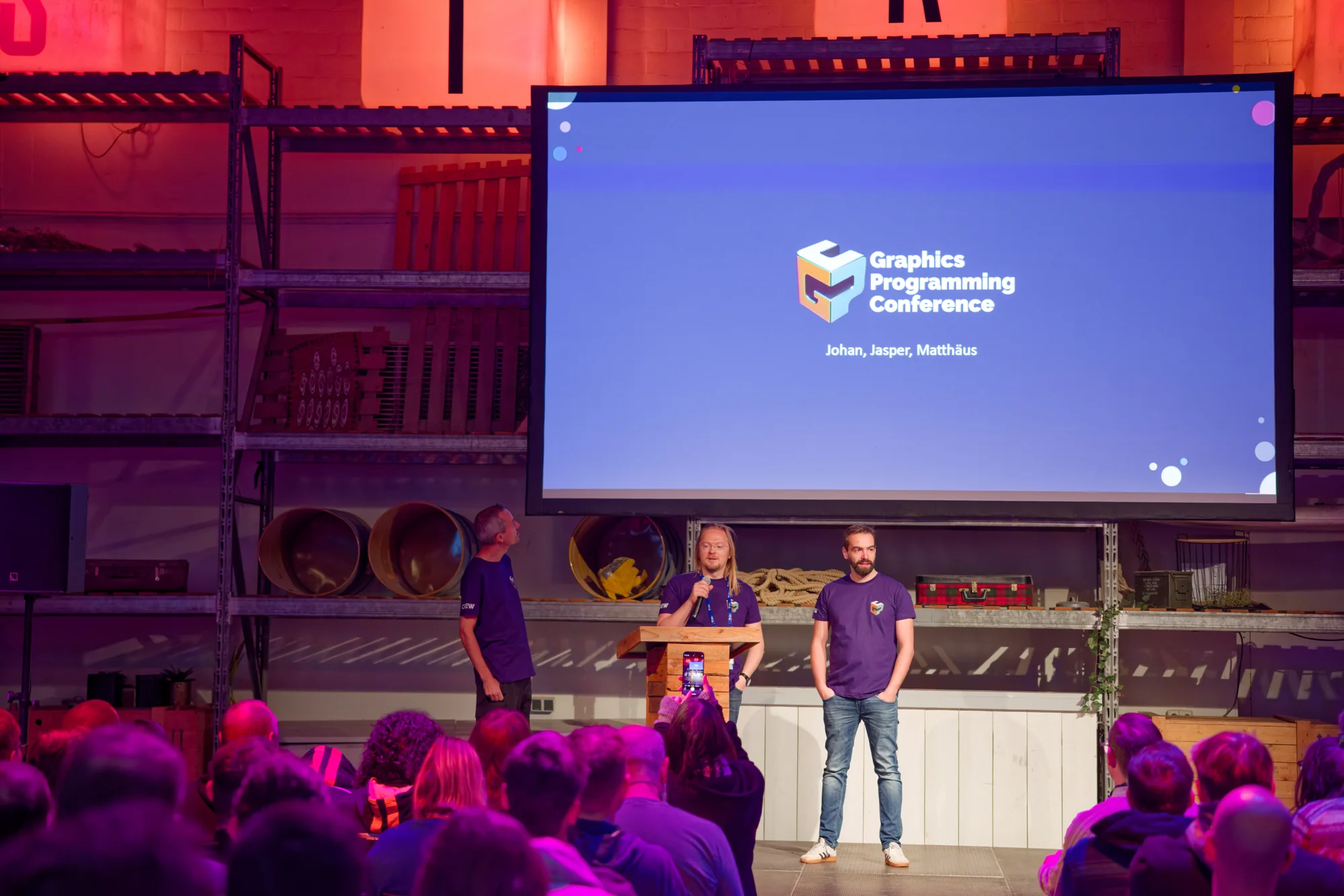Johan Andersson, Jasper Bekkers and Matthäus Chajdas opening the Graphics Programming Conference on stage in Breda.